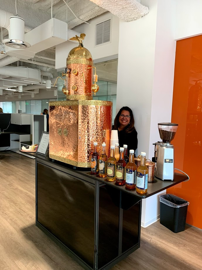 Picture of an elaborate copper espresso machine for a coffee station at a corporate event